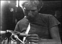 Peter making a flute in 72
